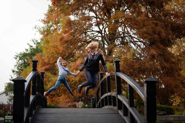 Autumnal Family Photoshoot, Mum and daughter Jumping | Michaela Howe Photography