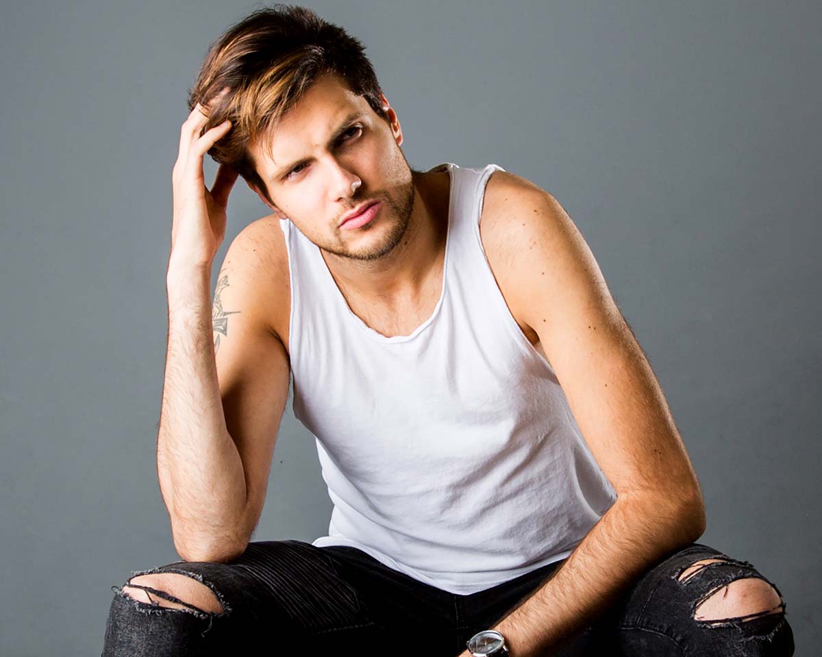 Male model portfolio headshot moody candid grey background | Michaela Howe Photography